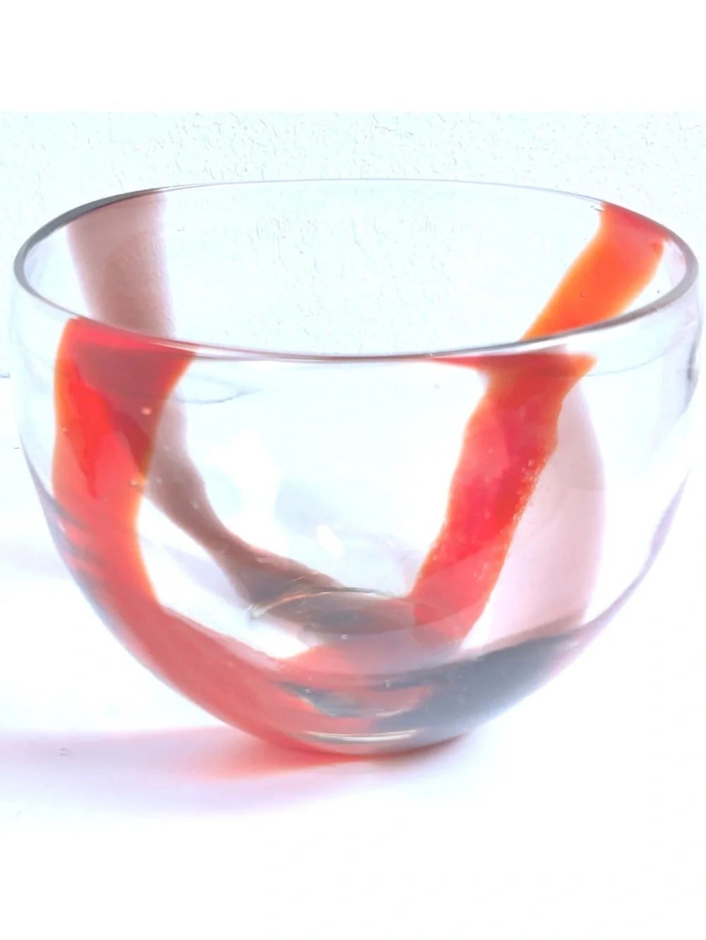 Hand-Blown Glass Bowl with Red Swirl Design